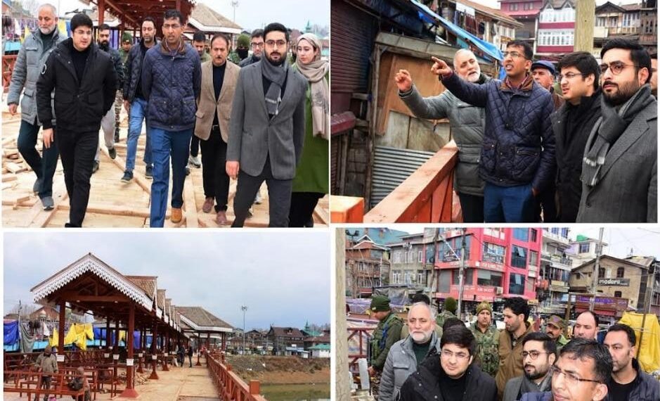Div Com Kashmir reviews wooden pedestrian bridge work at Amira Kadal