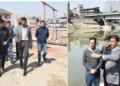 Div Com reviews developmental works progress