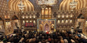 Worshippers gather in prayer at Dargah Hazratbal Shrine in Srinagar on Thursday