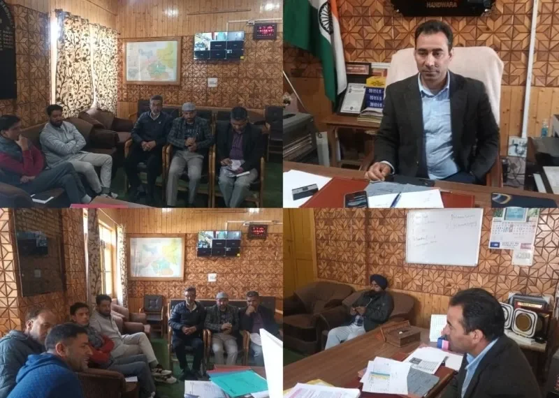 ADC Handwara chairs meeting on digitization of backlog mutations