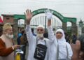 Pilgrims bidding adieu outside Haj House, Srinagar before leaving for Mecca for pilgrimage on Saturday