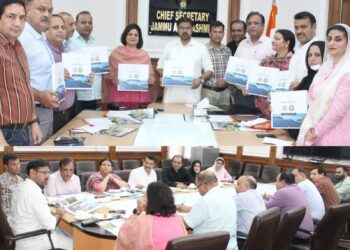 Satish Sharma releases Coffee Table Book on IEC activities