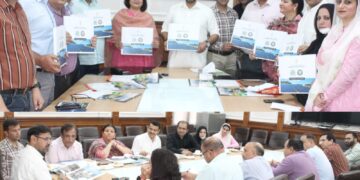 Satish Sharma releases Coffee Table Book on IEC activities