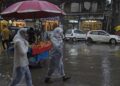 Rare snowfall in upper reaches, rains lash Kashmir plains