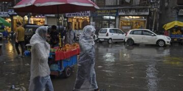Rare snowfall in upper reaches, rains lash Kashmir plains