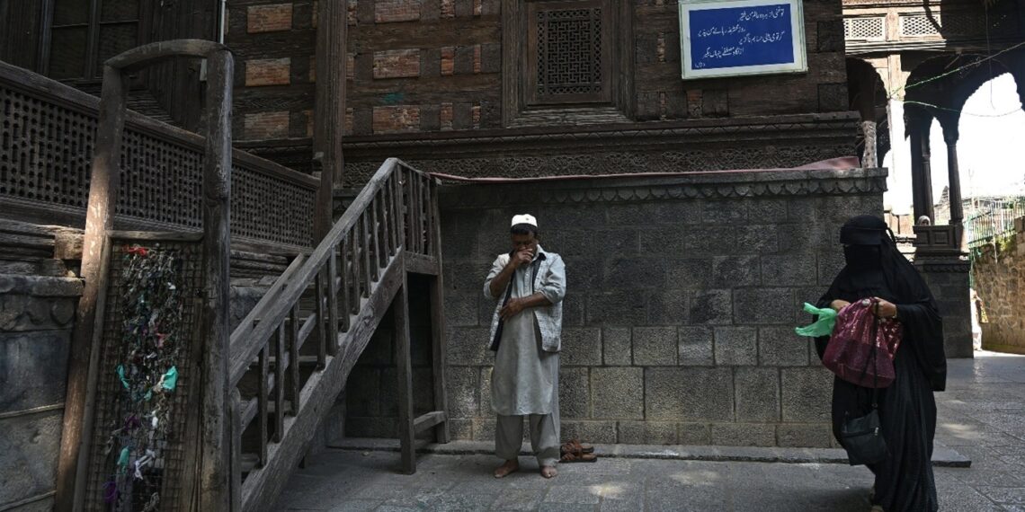 Man offering prayer at Khanqah-e-Moula shrine in old Srinagar on the Urs of Hazrat Mir Syed Ali Hamadani, popularly known in Kashmir as Shah-e-Hamadan (RA)
