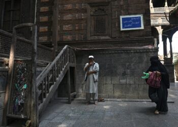 Man offering prayer at Khanqah-e-Moula shrine in old Srinagar on the Urs of Hazrat Mir Syed Ali Hamadani, popularly known in Kashmir as Shah-e-Hamadan (RA)