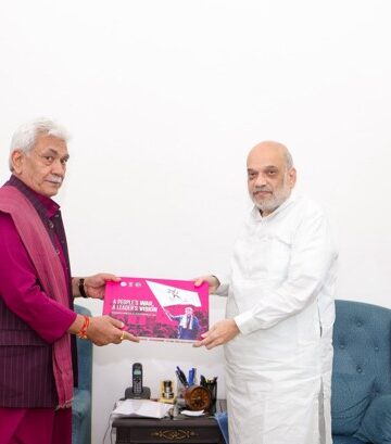 Jammu and Kashmir Lieutenant Governor Manoj Sinha meets Union Home Minister Amit Shah and presents Nasha Mukt J&K Campaign Coffee Table Book