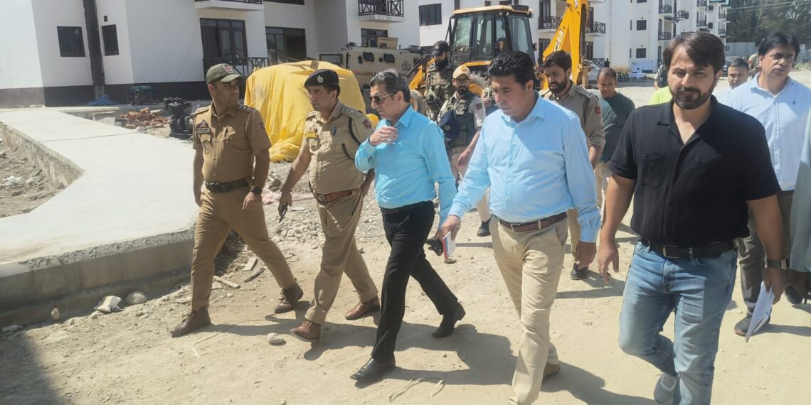 Dr Karwani inspects construction work in Transit accommodations for PM Package Employees