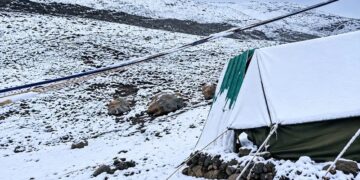 Snowfall in higher reaches, rain in plains cool Kashmir