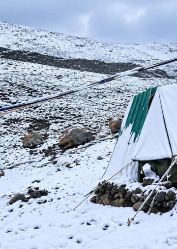 Snowfall in higher reaches, rain in plains cool Kashmir
