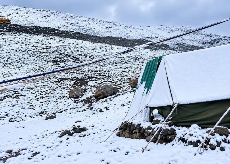 Snowfall in higher reaches, rain in plains cool Kashmir