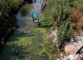 Workers and civic labourers have periodically cleaned Baba Demb, a historic freshwater lagoon in central Srinagar.